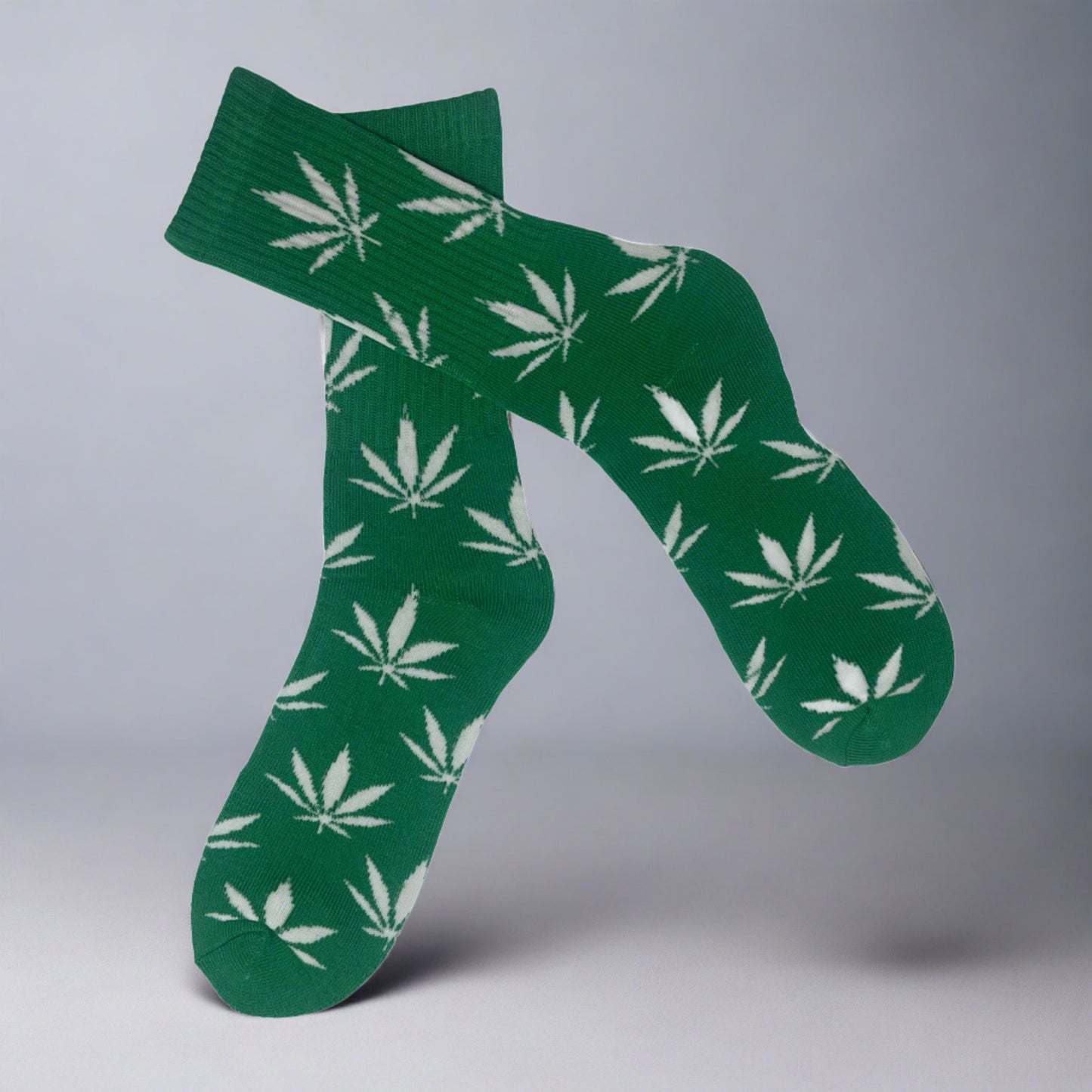green crew socks with white marijuana leaves