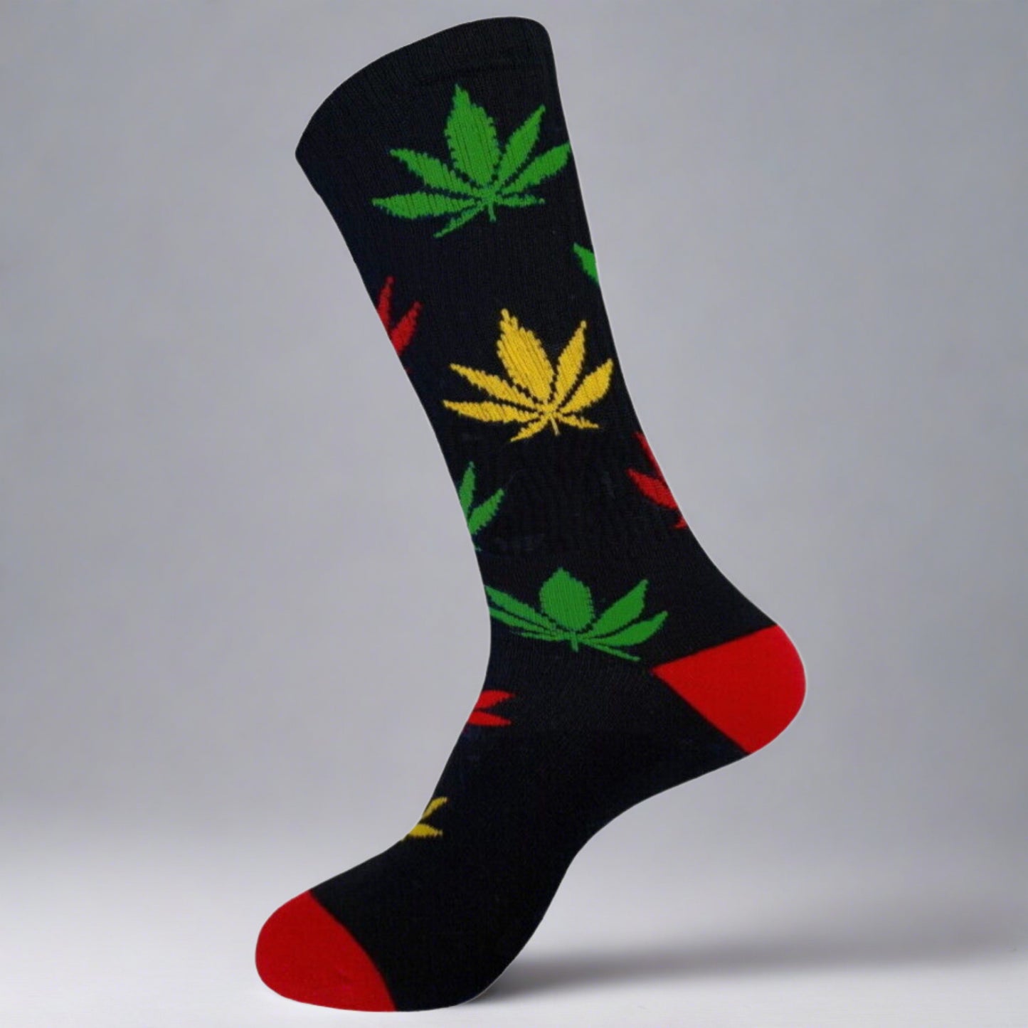 black crew socks with red toe and heel, and multiple colored marijuana leaves