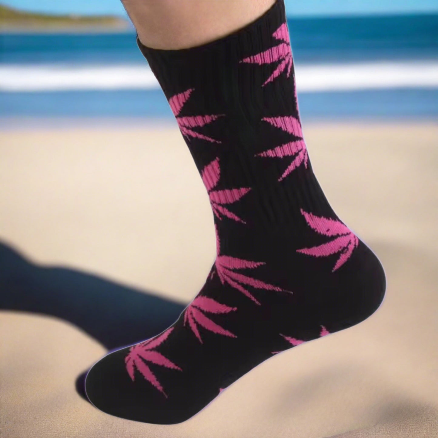 black crew socks with purple marijuana leaves at the beach