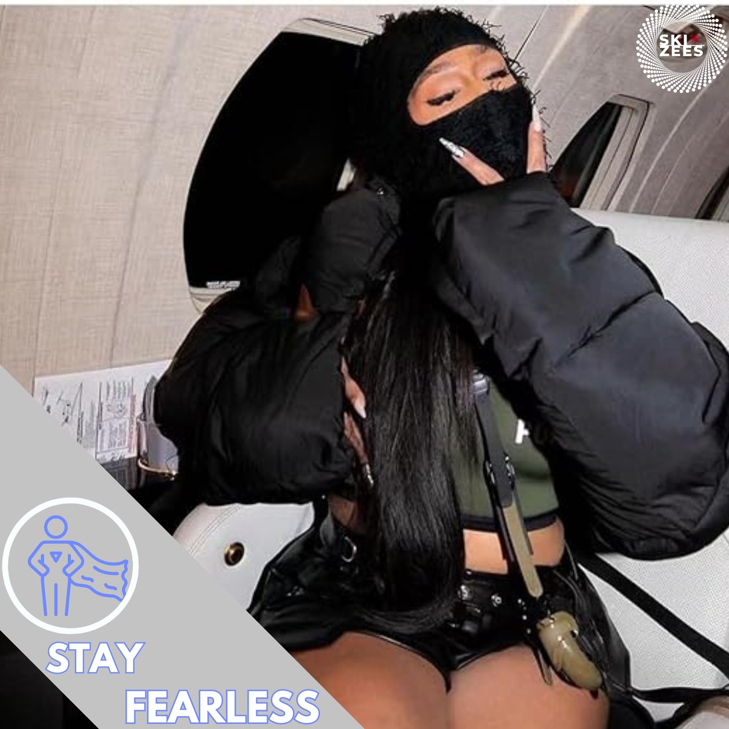 Black, distressed, ski mask, rap artist, flying in private jet stay fearless.