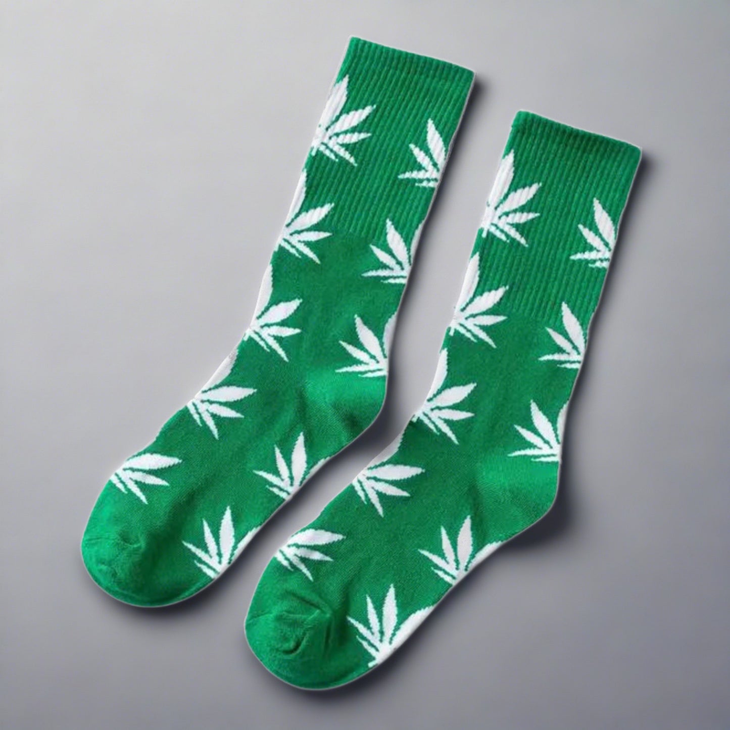white leaves on green socks