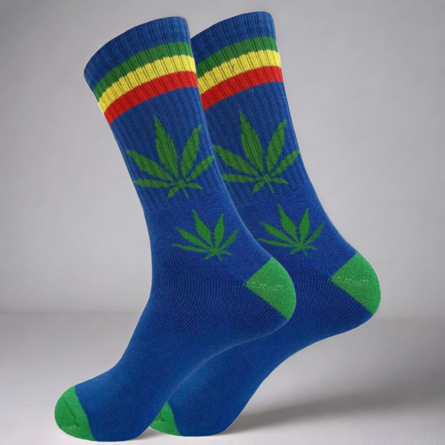 blue crew socks with green marijuana leaves, green toe and heel, and green yellow red stripes