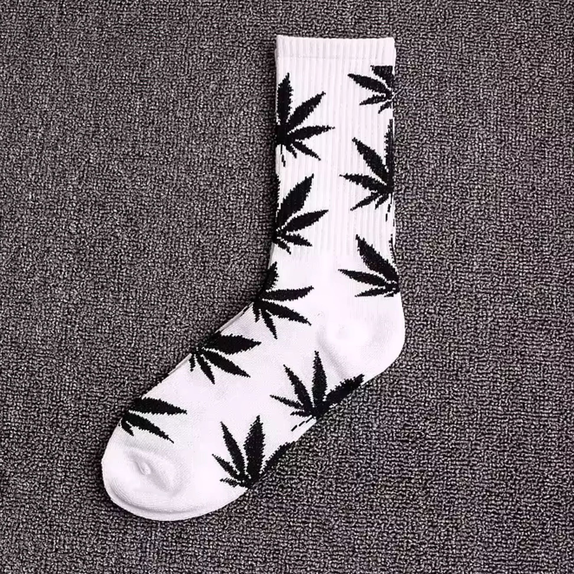 white crew socks with black marijuana leaves